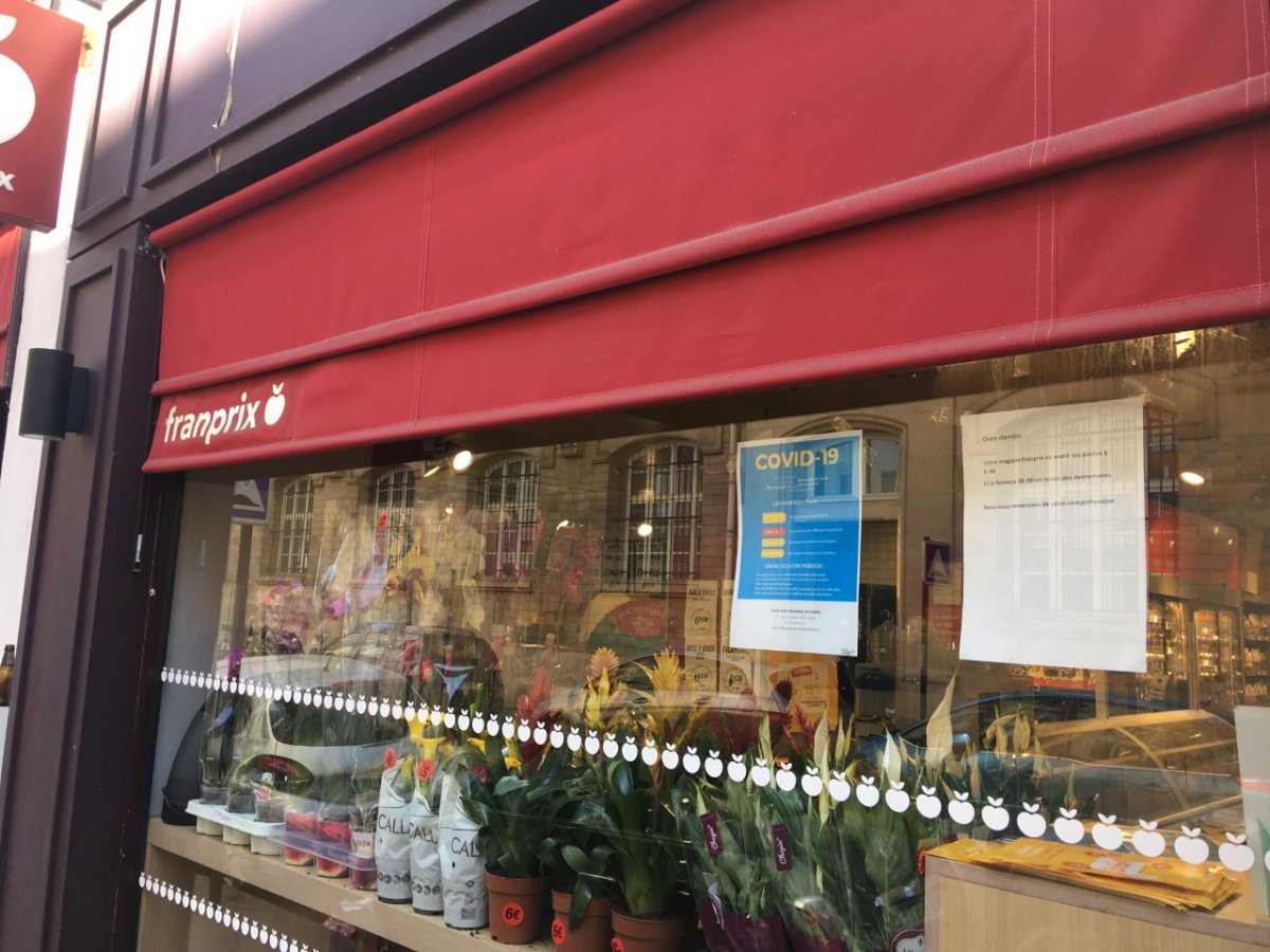 Affiche COVID paroisse chez un commerçant. 24 avril 2020 